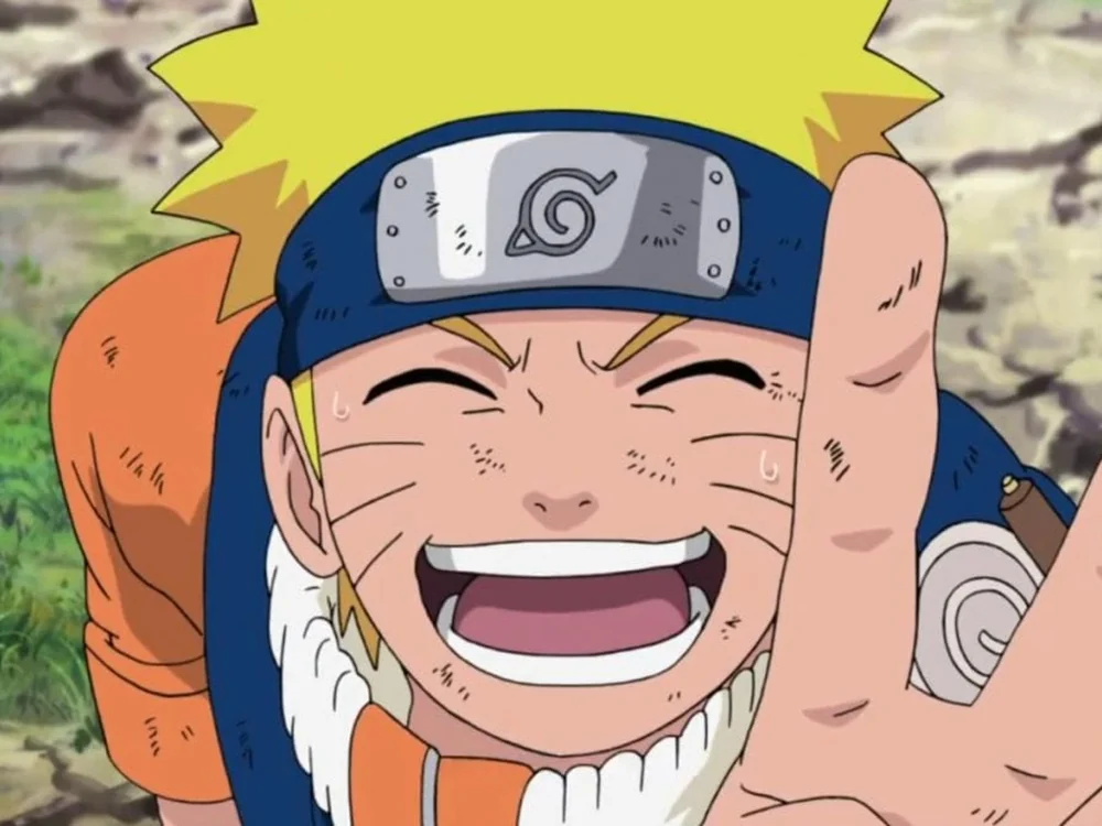 Cena do anime Naruto: o personagem sorrindo de olhos fechados, com a mão fazendo sinal de positivo.